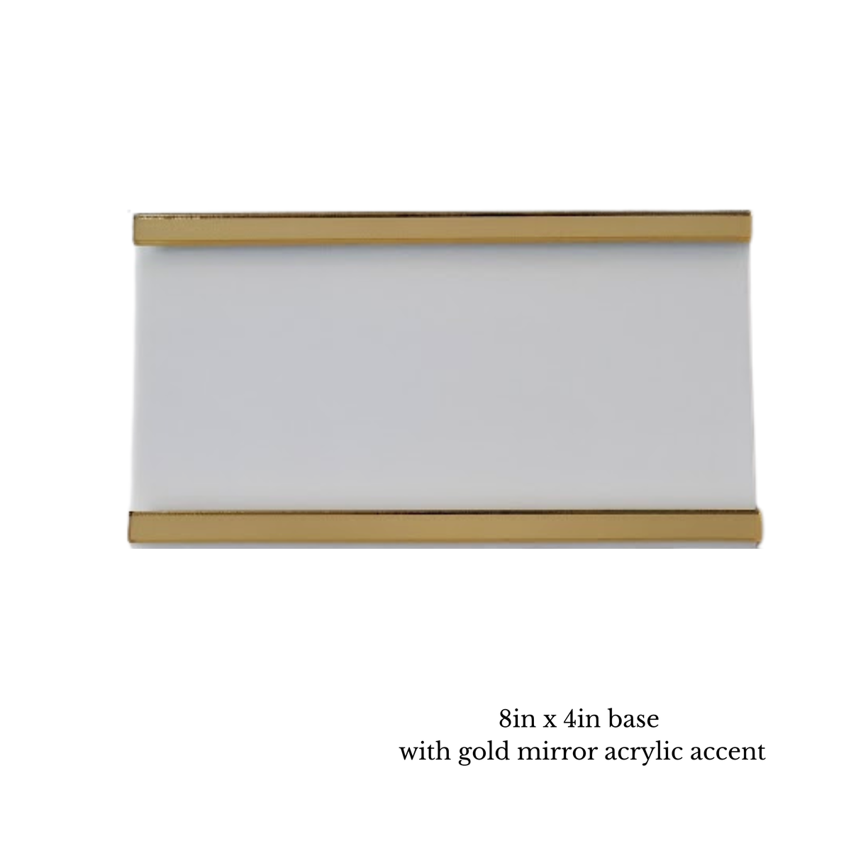 A rectangular wall sign base with a glossy white center and gold mirror acrylic trim at the top and bottom, shown on a plain white background with small text below reading '8in x 4in base with gold mirror acrylic accent'.