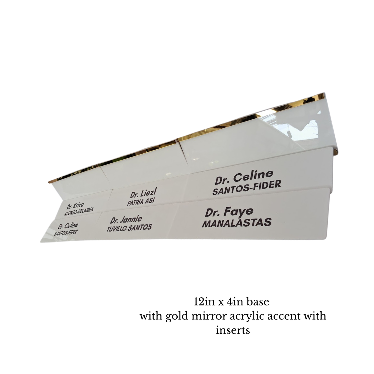 White acrylic nameplates with gold mirrored edges, shown at an angle on a white background with text indicating dimensions and product details.